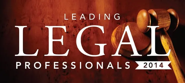 Wooden judge's gavel on brown background with text "Leading Legal Professionals 2014".