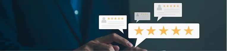 Person interacting with digital five-star rating and review icons on dark background.